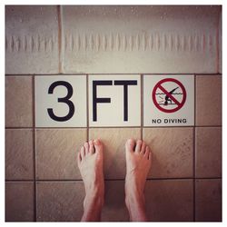 Low section of man with text