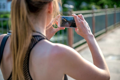 Young woman using mobile phone
