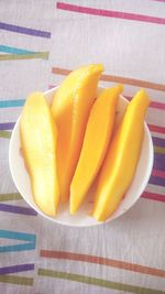 High angle view of fruits in plate on table