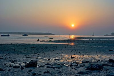 Scenic view of sea against sky during sunset