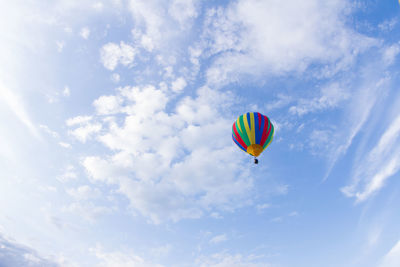 Low angle view of hot air balloon flying in sky