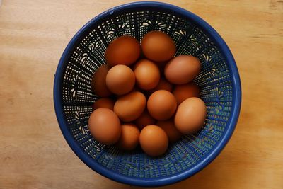 High angle view of eggs in container on table
