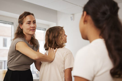 Teacher giving first aid training in case of choking