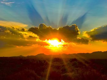 Scenic view of sunset over landscape