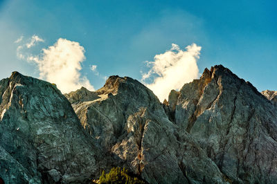 Low angle view of rocks against sky