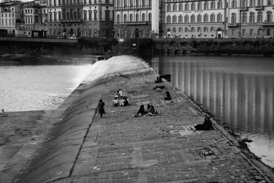 High angle view of people walking on pier