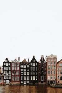 Buildings in distance with waterfront