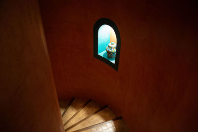 Low angle view of illuminated staircase in building