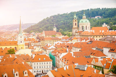 Aerial view of townscape against sky