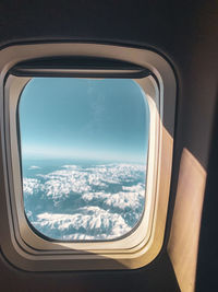 View of sky seen through airplane window