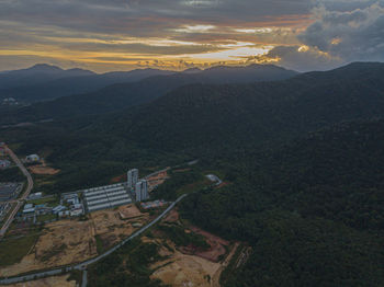 High angle view of mountains against sky during sunset