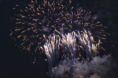 Firework display at night