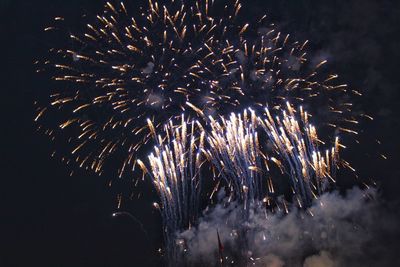 Firework display at night