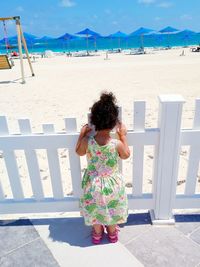 Full length of girl on beach