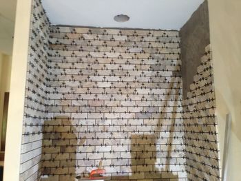 Low angle view of brick wall of building