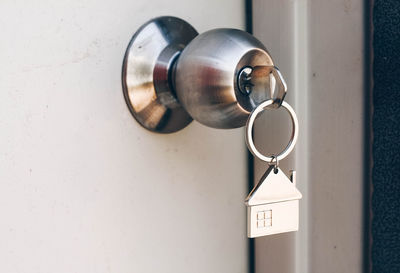 Close-up of door handle on wall