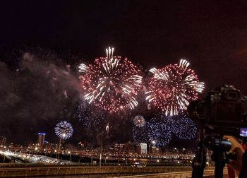 Firework display at night