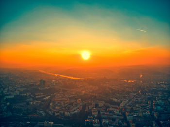 High angle view of townscape against sky during sunset