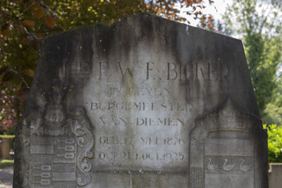 Text on stone at cemetery
