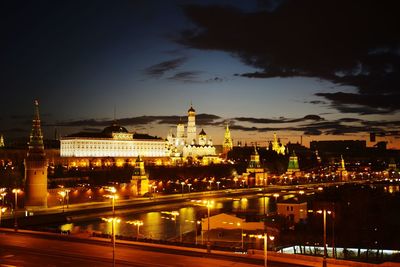 Illuminated buildings in city at night