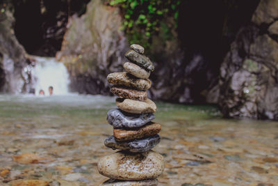 Close-up of stone stack on rock