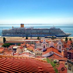 Cruise ship harbored at waterfront