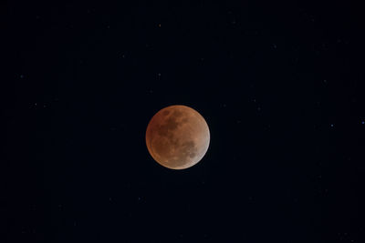 Scenic view of full moon against clear sky at night