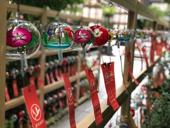 Close-up of decoration hanging at market stall