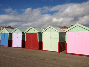 Beach huts against sky