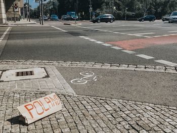 Road sign on street in city