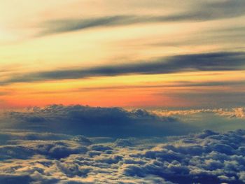 Low angle view of cloudy sky at sunset
