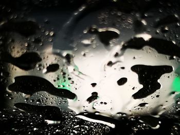 Full frame shot of wet glass window