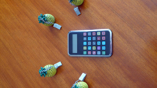 High angle view of clock on table
