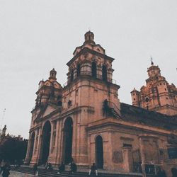 Low angle view of old building against sky