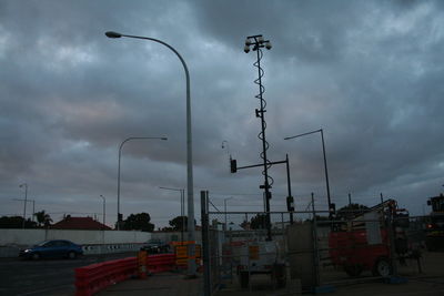 View of street light against cloudy sky