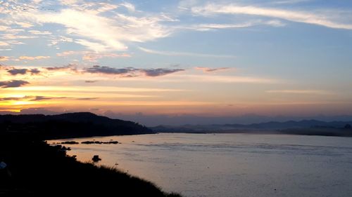 Scenic view of sea against dramatic sky