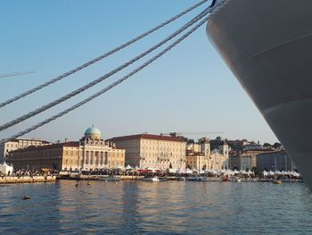 City at waterfront against sky