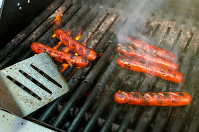 Close-up of meat on barbecue grill