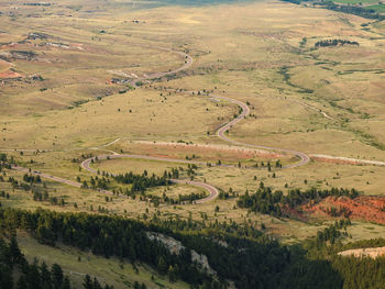 Long curvy switchback country road from the valley into the mountain