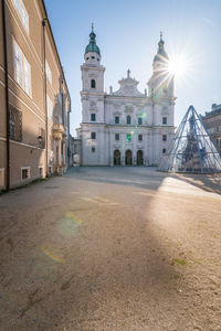 The cathedral of salzburg, austria surrounded by empty squares during the corona virus crisis.