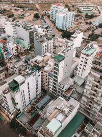 High angle view of buildings and street in city