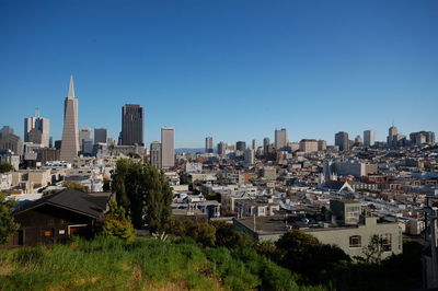 View of cityscape against clear sky