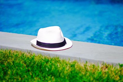 Close-up of hat on swimming pool