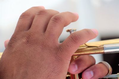 Close-up of musician playing brass instrument