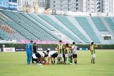 Group of people playing soccer