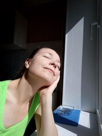 Portrait of woman looking at home