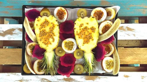 Close-up of fruits in plate on table