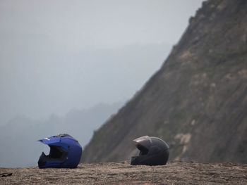 Scenic view of rocks on land against sky