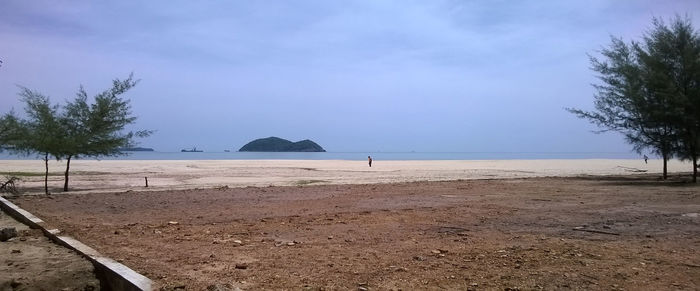 Scenic view of beach against sky