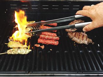 Close-up of meat on barbecue grill